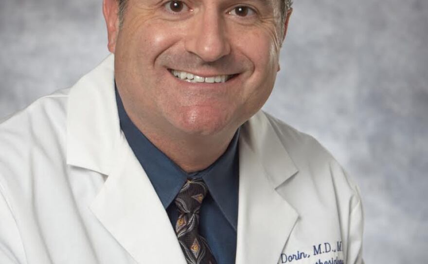 Dr. Adam Dorin.