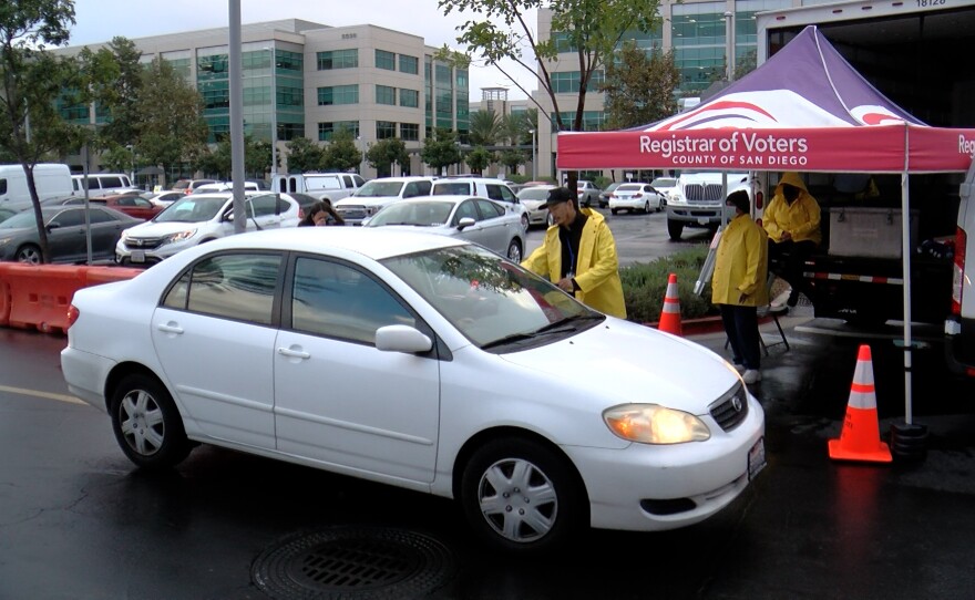 Voters utilizing the curbside ballot drop off at the Registrar of Voters in Kearny Mesa, Nov. 8, 2022.