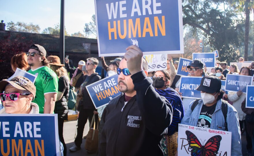 Immigrant rights advocates and supporters participate in a rally Monday, Dec. 2, 2024, at the State Capitol in Sacramento.