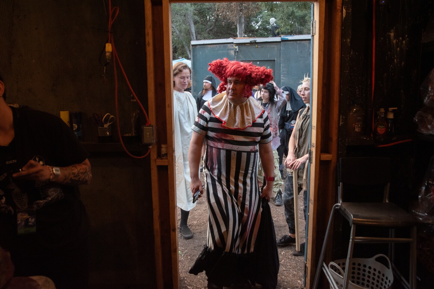 Jonathan Sturch in clown costume but before getting make up for The Haunted Trail. Sept. 25, 2025.
