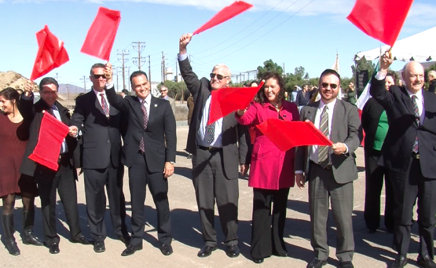U.S. and Mexico officials wave flags to signal the beginning of construction on a $700 million border infrastructure project in Otay Mesa, Dec. 10, 2013. Dignitaries include: Assemblywoman Lorena Gonzalez, D-San Diego, county Supervisor Greg Cox, San Diego Association of Governments Chairman Jack Dale, Consul General of Mexico in San Diego Remedios Gomez-Arnau, and state of Baja Director of International Relations Mariano Escobedo.