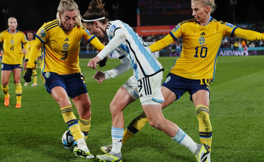 Sweden's Linda Sembrant, left, and Sofia Jakobsson challenge Argentina's Paulina Gramaglia for the ball on Wednesday in Hamilton, New Zealand. Sweden won its group and will face the U.S. in its next match.