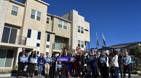 San Diego Mayor Todd Gloria announce his "Homes For All of Us" initiative with his supporters at 3Roots in Mira Mesa, Calif. on Dec. 10, 2025.