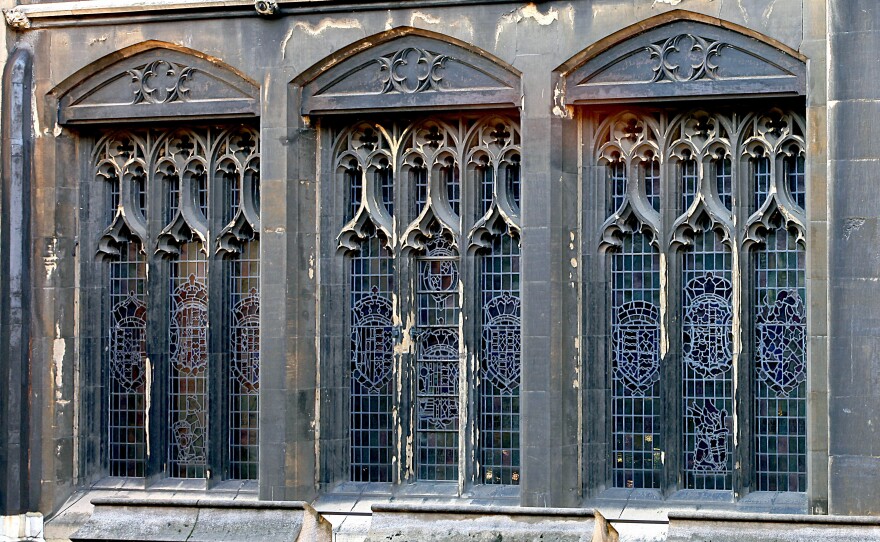 Palace windows show signs of age and decay.