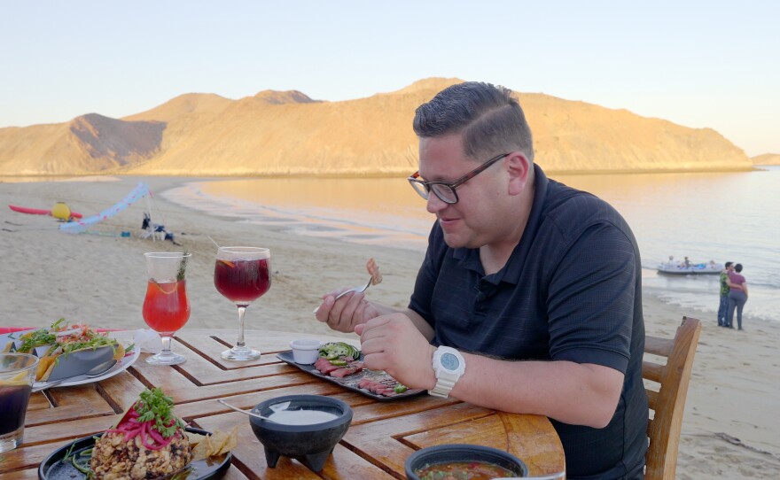 Host Jorge Meraz eating at Alfonsinas on the beach of Bahia Gonzaga.