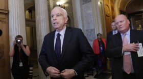 Sen. John McCain, R-Ariz., who returned to Capitol Hill after being diagnosed with an aggressive type of brain cancer, leaves the chamber after vote the Republican-run Senate rejected a GOP proposal to scuttle President Barack Obama's health care law, Wednesday, July 26, 2017. 