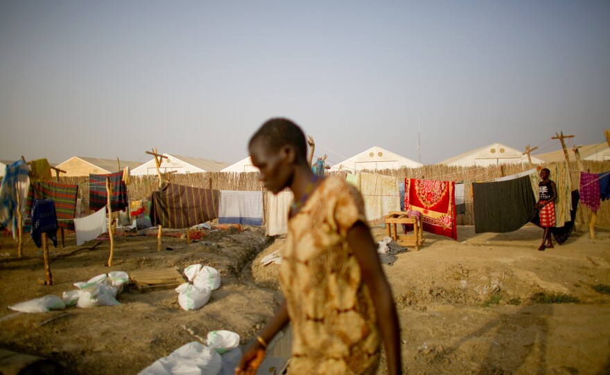 A woman walks through the Doctors Without Borders compound in Bentiu. The 170-bed facility treats many patients suffering from severe malnutrition and malaria. It is the only hospital for miles around capable of providing surgical and advanced medical care.