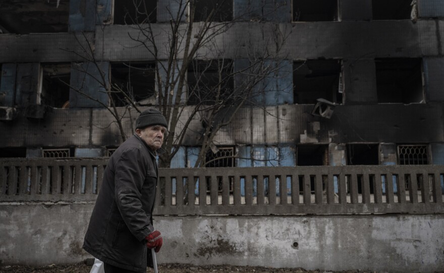 Dnipro: A man walks past a damaged building after Russian airstrikes which killed 6 and injured around 28 people.