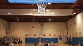 Marines competing in wheelchair basketball.