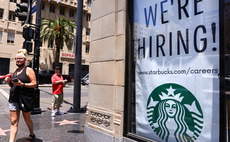 A recruitment sign hangs at Starbucks in Los Angeles.