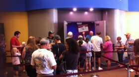People line up to see the Reuben H. Fleet Science Center's IMAX film Tornado Alley, on April 28, 2011.