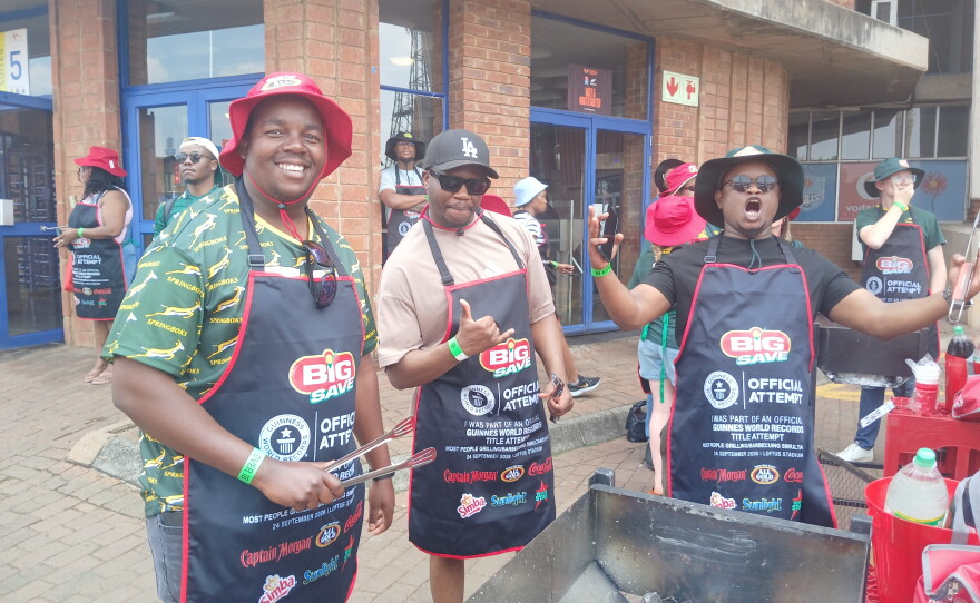 Participants braai boerewors.