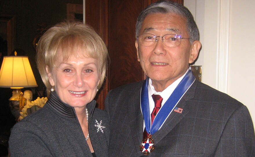 Norman Mineta (right) is awarded Presidential Medal of Freedom. His wife Deni is on his left. The White House ceremony took place on Friday, Dec. 15, 2006.