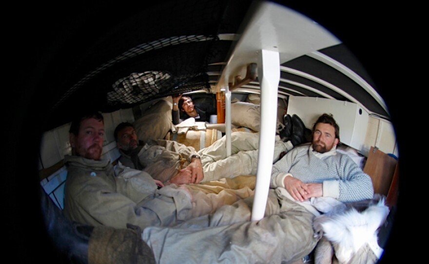 Below deck, fish eye image of Tim Jarvis, Nick Bubb, Ed Wardle, Barry Gray.