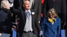 Gov.-elect Glenn Youngkin waves to the crowd at his inauguration, Jan. 15, 2022, in Richmond, Va.