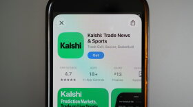 FILE - An ad for the prediction market app Kalshi is displayed on a mobile phone on April 16, 2026, in Chicago. (AP Photo/Erin Hooley, File)