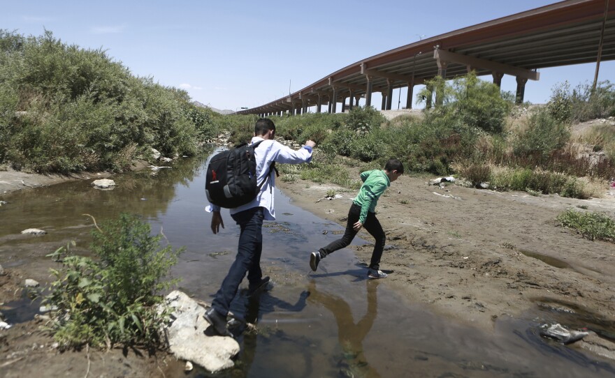 Migrants cross the Rio Grande into the United States, to turn themselves over to authorities and ask for asylum, in Ciudad, Juarez, in June.