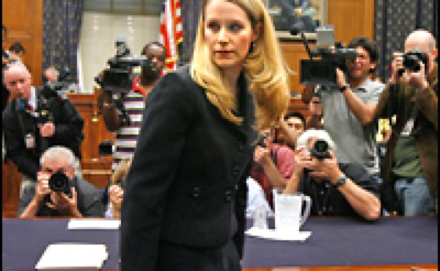 Monica Goodling, former Justice Department White House liaison, prepares to testify to the House Judiciary Committee on Capitol Hill.