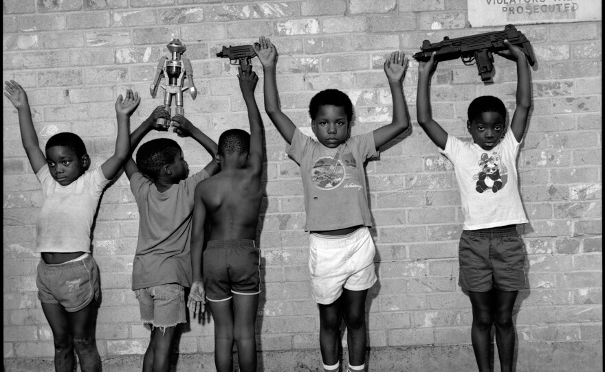 Children playing gangsters. South Dallas, 1988.