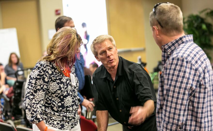 Hudson Freeze talks with parents at the annual Sanford Burnham Prebys Rare Disease Day Symposium in La Jolla, which took place Feb. 28-29, 2016.