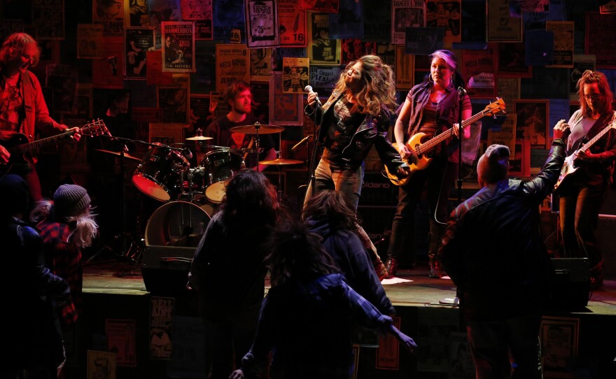 Ron Nine, Mitch Ebert, Eden Schwartz, Fiia McGann and Gretta Harley perform in <em>These Streets</em>, a new play based on a series of interviews with Seattle musicians.