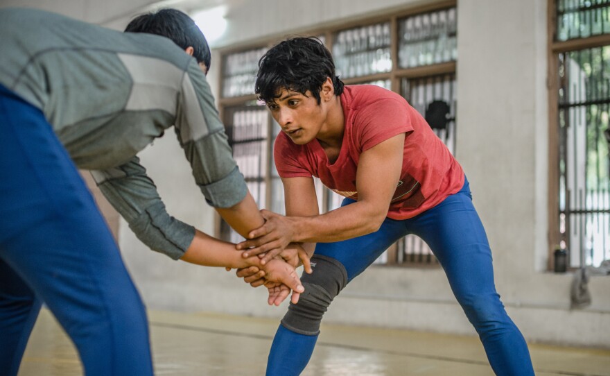 Neetu trains nearly 8 hours a day at a wrestling facility in Rohtak, India. Her coach says, "She doesn't take a break for even one minute."