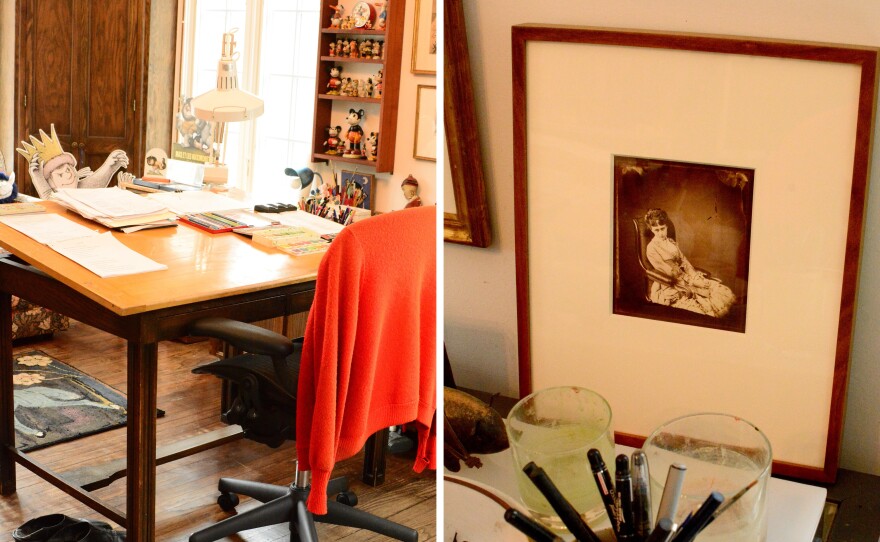 Maurice Sendak's home studio, left, remains as it was during the time he was working there, down to the sweater on the chair and the slippers on the floor. He kept an image of Lewis Carroll's Alice, right, by his desk for inspiration.