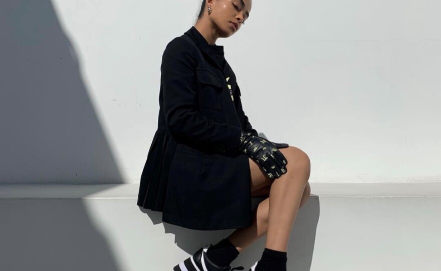 Alexis Quintero poses in Comme des Garcons x Nike platform Cortezes.