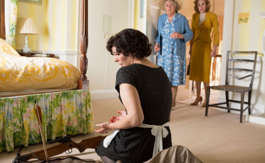 Mrs. McCarthy and Lady Felicia see a trembling Mimi (Rae Baker) with blood on her hands next to a dead Count Fiskon.