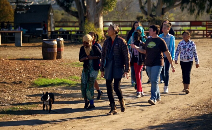 Chef Su-Mei Yu visits Suzie's Farm with a group of Pro Kids.