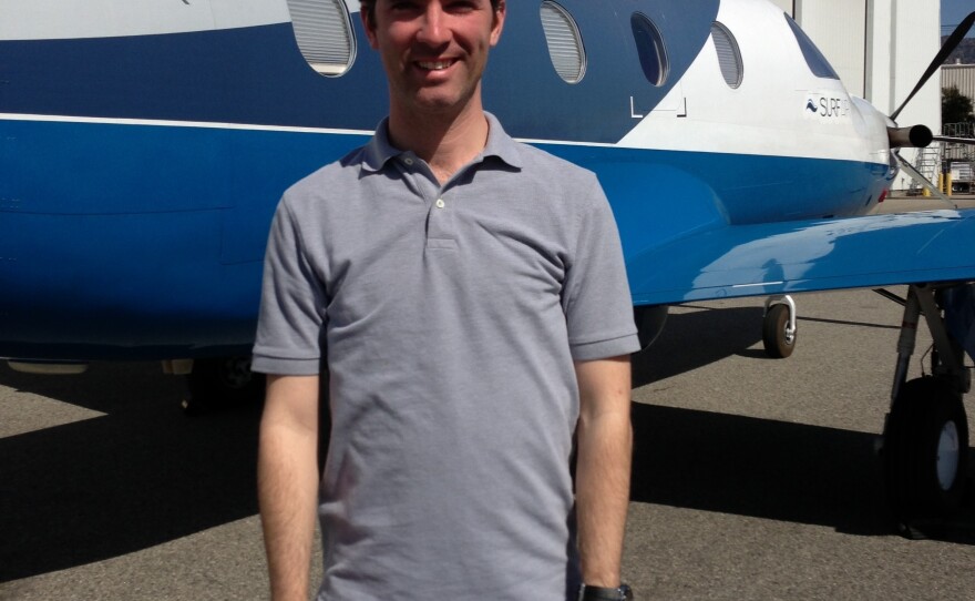 Surf Air CEO Wade Eyerly stands in front of one of the airline's turboprop planes in Burbank, Calif. Eyerly boasts that Surf Air will offer frequent commuters a corporate jet experience for not much more than regular airline prices.