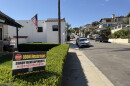 A sign in the front yard of a home in Point Loma reads "Stop 1004 Rosecrans — shady developments in our neighborhood," Oct. 16, 2026.