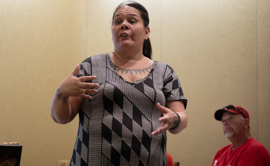 Mehana Hind is a cultural liaison with the Council for Native Hawaiian Advancement. She is speaking to members of the U.S. Army Corps of Engineers, newly arrived from the mainland to work on the cleanup of the deadly wildfires that swept Lahaina on Maui last summer.