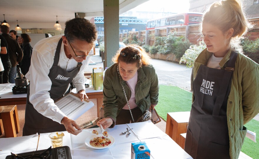 Judges taste test an entry in Friday's London Porridge Championships.