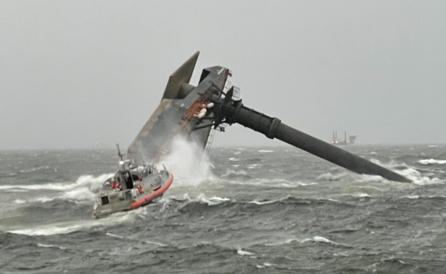 A Coast Guard Station Grand Isle boatcrew heads toward a capsized 175-foot commercial lift boat April 13 searching for people in the water 8 miles south of Grand Isle, Louisiana.