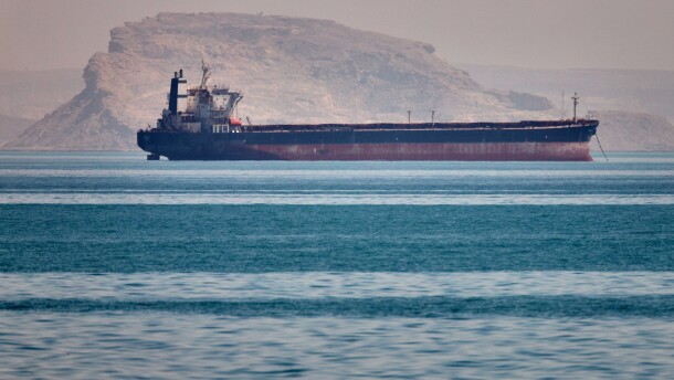 A bulk cargo ship sits at anchor in the Strait of Hormuz off Bandar Abbas, Iran, Saturday, May 2, 2026.