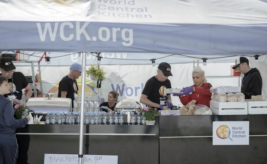 Volunteers from the World Central Kitchen prepare food for Ukrainian refugees crossing the Polish border in Medyka, Poland.