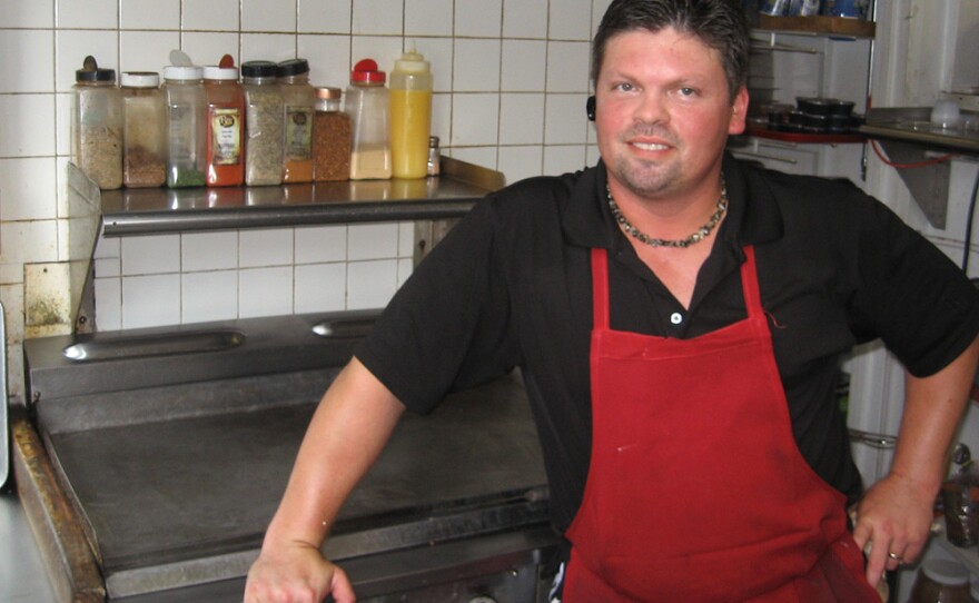 Ron Crochetiere at his restaurant, City Jake's Cafe, in Springfield. He has seen his income drop by about $1,000 a month during the recession.