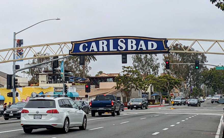 A photo of the Carlsbad sign spanning Carlsbad Boulevard, May 23, 2022. 