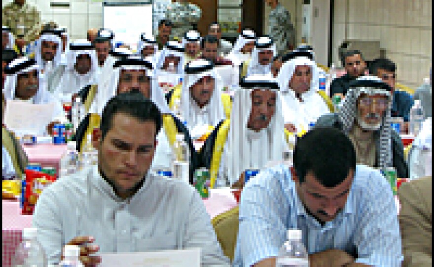 Local tribal leaders, police and municipal officials meet under the auspices of the 101st Airborne Division's 1st Squadron, 32nd Cavalry unit at Camp Paliwoda, north of Baghdad.
