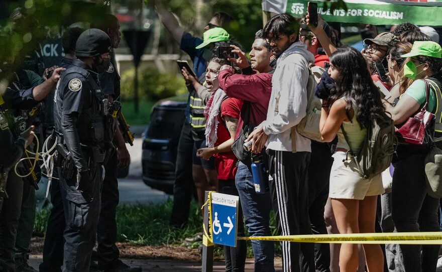Protesters and police clash during an April 25 pro-Palestinian protest at Emory University's campus in Atlanta.