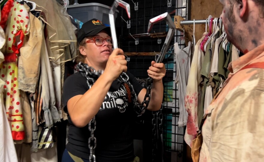 Nicole Weaver not only puts scare-actors in costume but also provides appropriate props at The Haunted Trail. Sept. 25, 2025