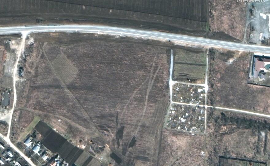 March 19, 2022: an overview of a cemetery and the early expansion of graves.