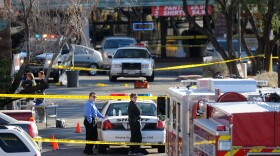 Police quarantine the shopping center where U.S. Rep. Gabrielle Giffords (D-AZ) and several others were shot during an event in front of a Safeway grocery store January 8, 2011 in Tuscon, Arizona. U.S. Rep. Gabrielle Giffords (D-AZ) was shot in the head at a public event entitled 'Congress on your Corner' when a gunman opened fire outside a Safeway grocery store in Tucson, Arizona. 