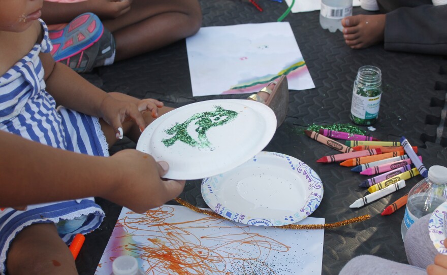 On a recent day, the sidewalk school in Matamoros, Mexico, began with arts and crafts.