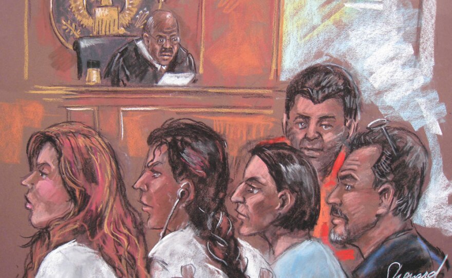 This New York courtroom drawing from June 28 shows five of the 10 Russian spy suspects arrested in the United States.