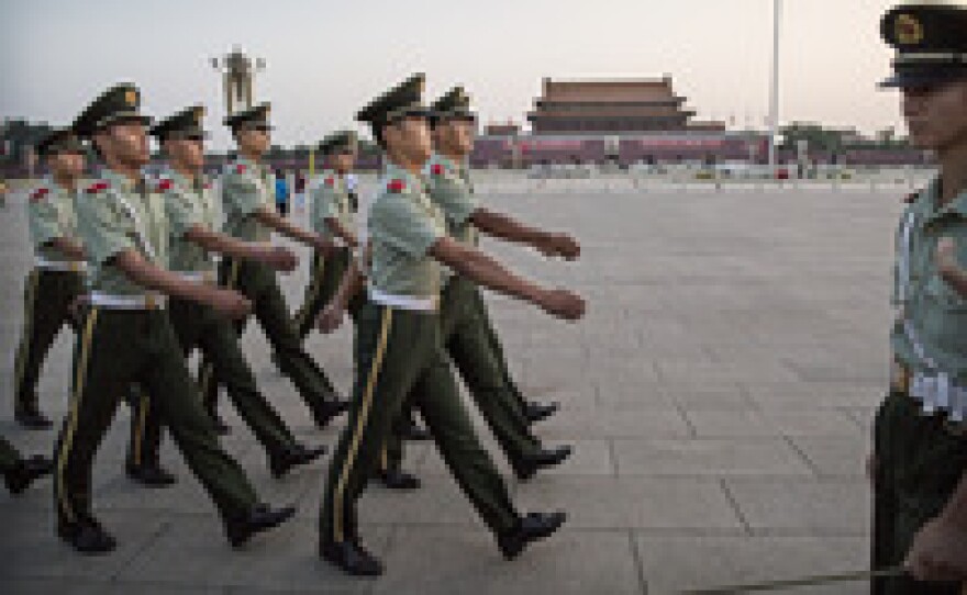 Chinese paramilitary officers march in Tiananmen Square on Tuesday in Beijing. The government has launched an unprecedented effort to suppress any public, or private, commemoration of June 4, 1989.