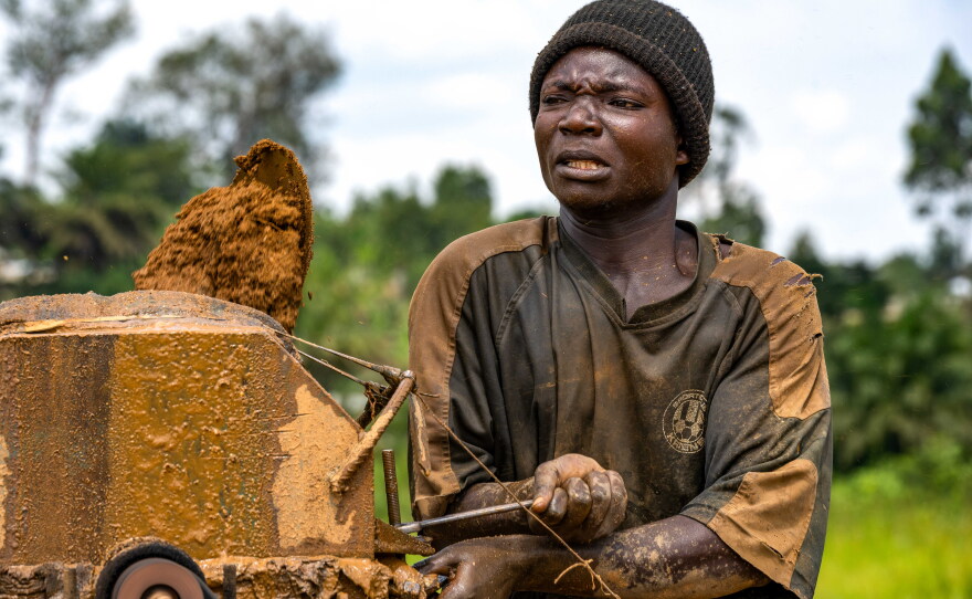 A portrait of Léon Gina at the Maidede mine, which is an artisanal gold-mining site. The mine is part of the informal gold economy that continues to draw workers to the area amid the Ebola outbreak.