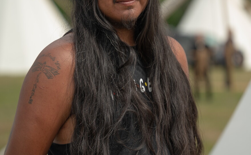 Christopher Eagle Bear, 27, is the youngest tribal council member for the Rosebud Sioux Tribe. He said the commemoration was about reclaiming and celebrating their identity. 
