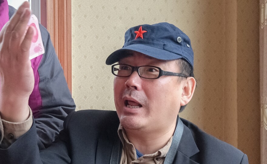China has arrested Yang Hengjun, an author and former Chinese diplomat who is now an Australian citizen. He's seen here in a 2014 photo on social media that was taken during a visit to Tibet.